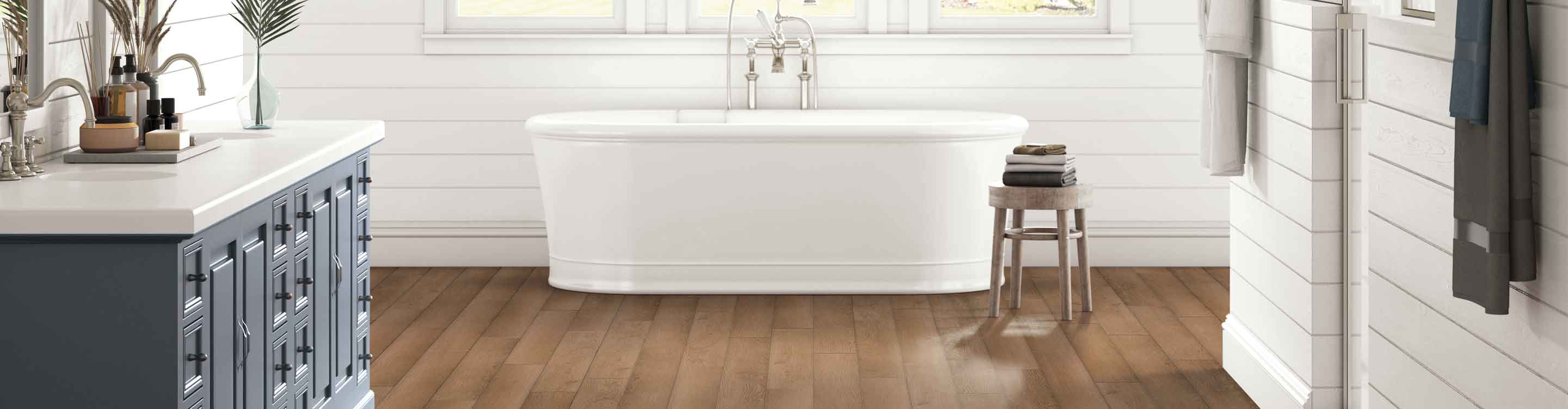 Vinyl tile bathroom floor with tub. 