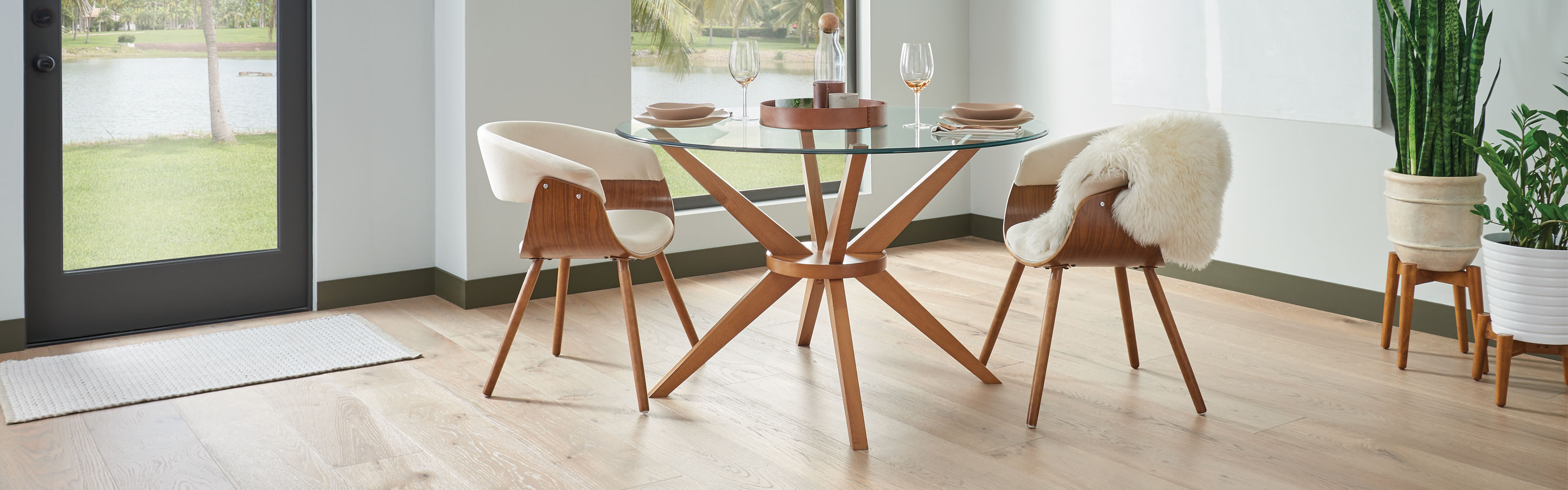 light hardwood flooring in boho dining room